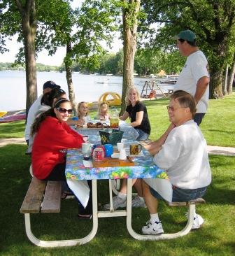 Guests enjoying homemade doughnuts with Bob