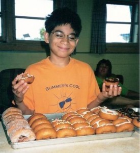 Chris with a handful of donuts