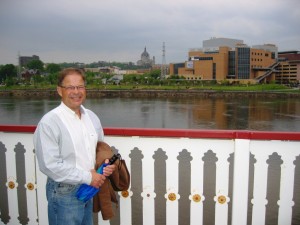 Bob on Showboat with Cathedral & Science Museum in background