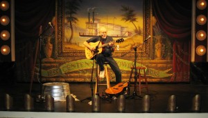 Peter singing with auction guitar