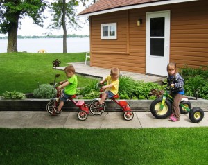 3 children on Tricycles