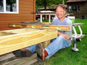 Bob leveling the cabin bench