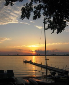 Lake Florida sunset with sailboat near Spicer, MN