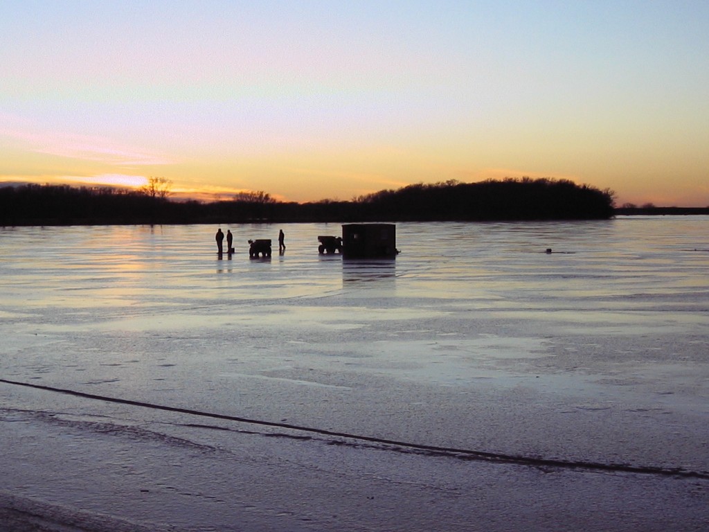 Fishermen in sunset at Lake Florida