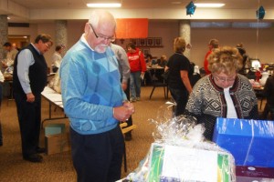 Looking over the auction items